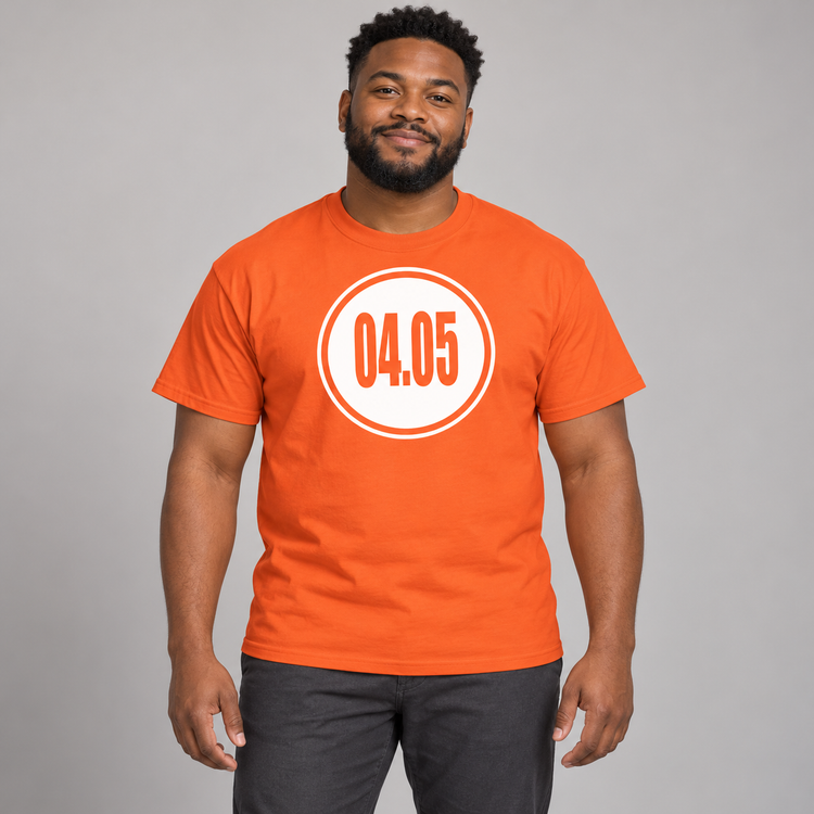 AI-generated model in his 20s wearing the orange 04.05 circle tee in a clean studio